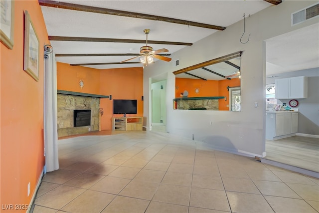 3100 Garehime St, Las Vegas, NV 89108 - unfurnished living room with a fireplace, ceiling fan, and light tile patterned floors