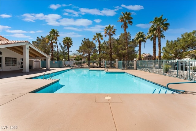 7945 Delbonita Ave, Las Vegas, NV 89147 - community pool featuring a patio area and fence