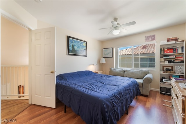 7945 Delbonita Ave, Las Vegas, NV 89147 - bedroom featuring wood finished floors and a ceiling fan
