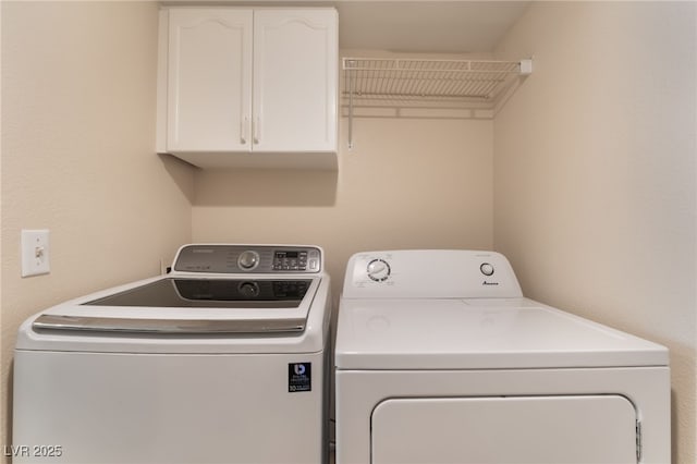 7945 Delbonita Ave, Las Vegas, NV 89147 - washroom featuring cabinet space and washing machine and dryer