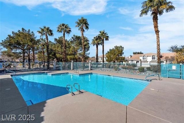 7945 Delbonita Ave, Las Vegas, NV 89147 - pool featuring a patio and fence