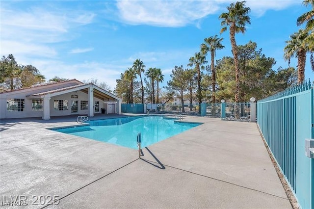 7945 Delbonita Ave, Las Vegas, NV 89147 - community pool featuring fence and a patio