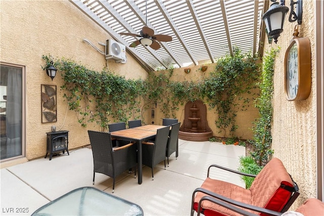 view of patio featuring outdoor dining area, a pergola, a fenced backyard, and ceiling fan