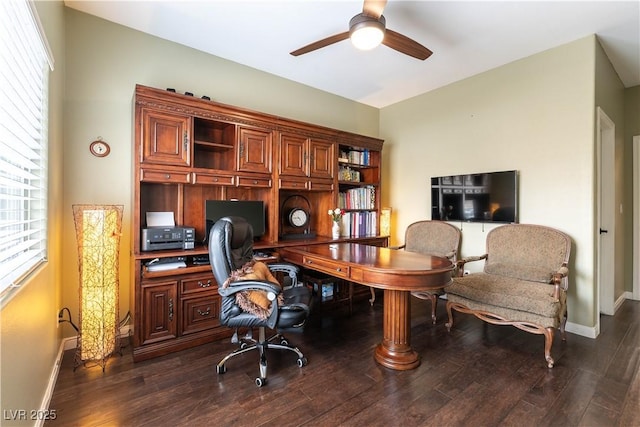 office area featuring baseboards, ceiling fan, and dark wood-style flooring
