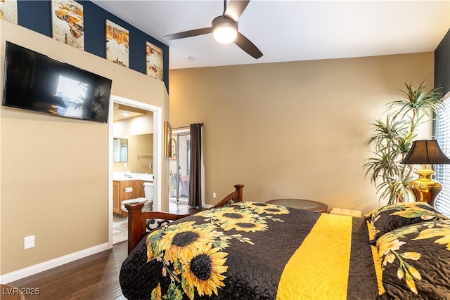 bedroom with wood finished floors, ensuite bath, a ceiling fan, and baseboards