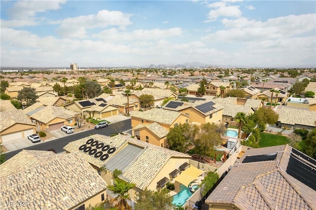 birds eye view of property with a residential view