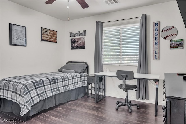 bedroom with visible vents, a ceiling fan, and wood finished floors