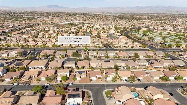 aerial view with a mountain view and a residential view