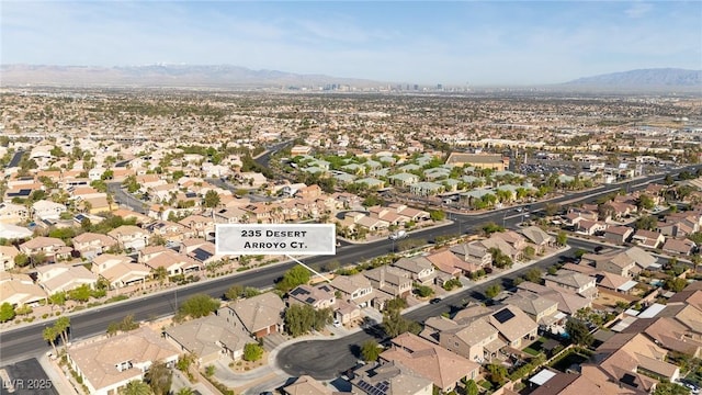 aerial view featuring a residential view and a mountain view