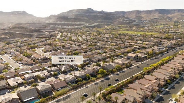 birds eye view of property featuring a residential view and a mountain view