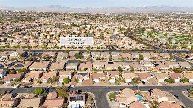 aerial view with a mountain view and a residential view