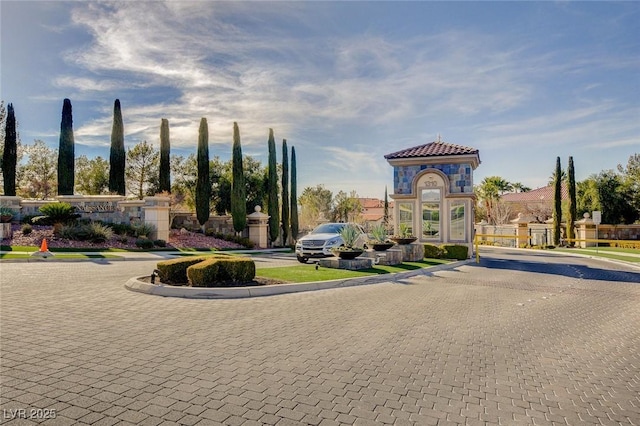 exterior space with a gate