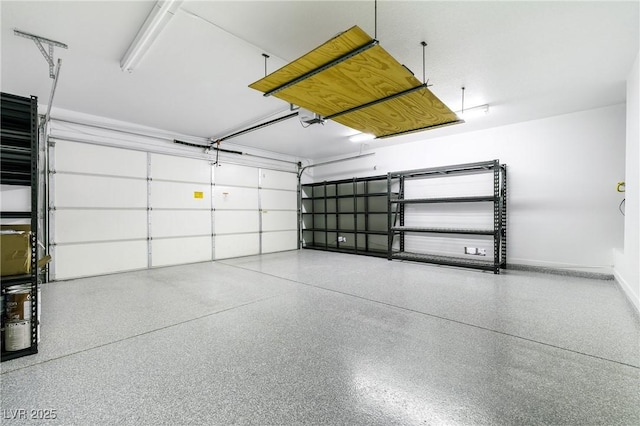 2401 Rice Flower Cir, Las Vegas, NV 89134 - garage featuring baseboards