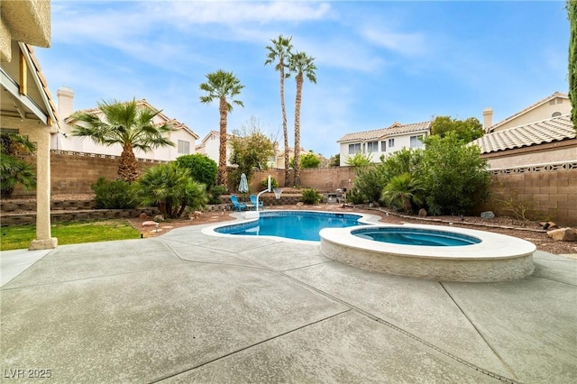 2401 Rice Flower Cir, Las Vegas, NV 89134 - view of swimming pool with a fenced backyard, a patio area, and a pool with connected hot tub