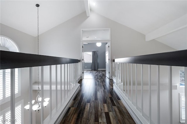 2401 Rice Flower Cir, Las Vegas, NV 89134 - hallway with dark wood-style flooring and a chandelier