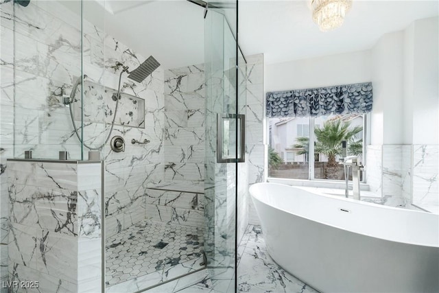 2401 Rice Flower Cir, Las Vegas, NV 89134 - bathroom with a marble finish shower, a freestanding bath, marble tiled flooring, and a chandelier