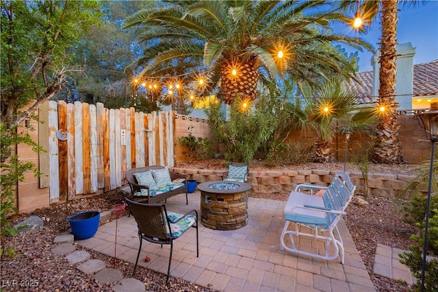 2401 Rice Flower Cir, Las Vegas, NV 89134 - view of patio featuring a fire pit and fence