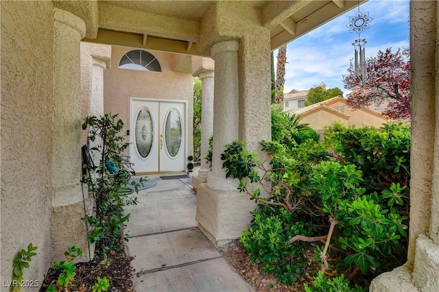 2401 Rice Flower Cir, Las Vegas, NV 89134 - doorway to property featuring stucco siding