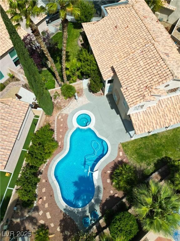 2401 Rice Flower Cir, Las Vegas, NV 89134 - drone / aerial view of a pool area