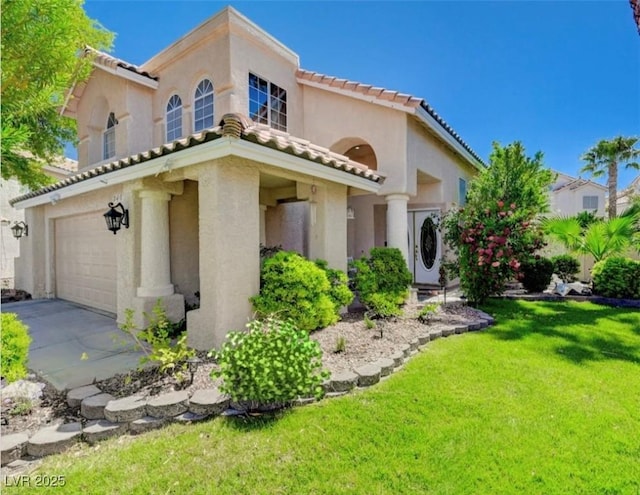 2401 Rice Flower Cir, Las Vegas, NV 89134 - mediterranean / spanish-style house featuring stucco siding, a front lawn, a tile roof, driveway, and an attached garage