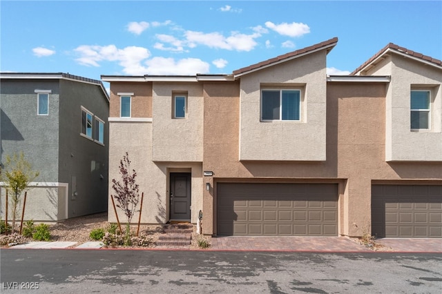 2902 Hemi Orange Ave, North Las Vegas, NV 89086 - multi unit property with a garage, driveway, and stucco siding