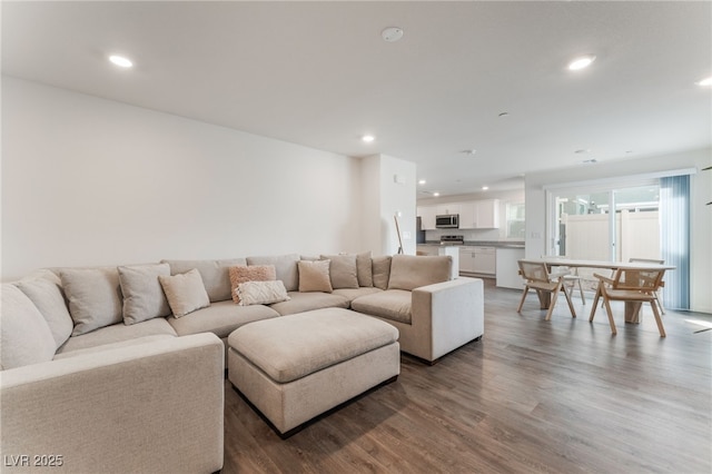 2902 Hemi Orange Ave, North Las Vegas, NV 89086 - living room featuring dark wood-style floors and recessed lighting