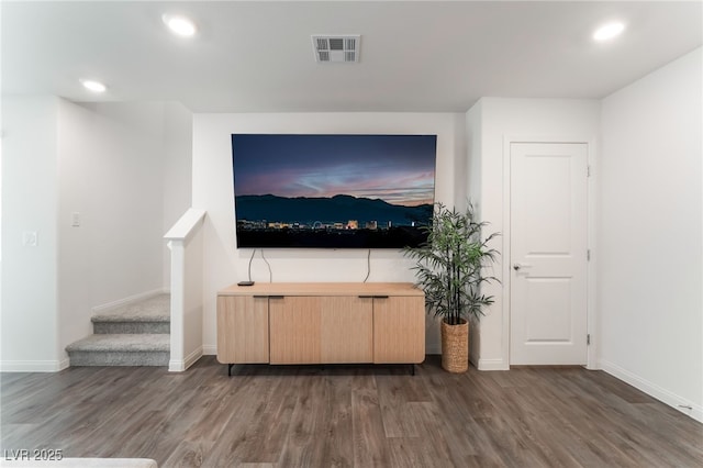 2902 Hemi Orange Ave, North Las Vegas, NV 89086 - unfurnished living room featuring visible vents, baseboards, recessed lighting, and wood finished floors