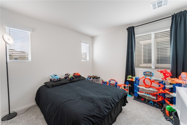 2902 Hemi Orange Ave, North Las Vegas, NV 89086 - bedroom with visible vents, baseboards, and carpet flooring
