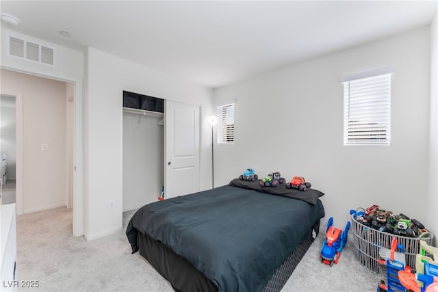 2902 Hemi Orange Ave, North Las Vegas, NV 89086 - bedroom with visible vents, a closet, baseboards, and carpet floors