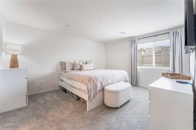2902 Hemi Orange Ave, North Las Vegas, NV 89086 - bedroom featuring light carpet, visible vents, and baseboards