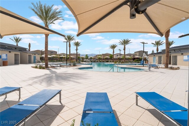 2902 Hemi Orange Ave, North Las Vegas, NV 89086 - community pool with a patio, a residential view, and ceiling fan