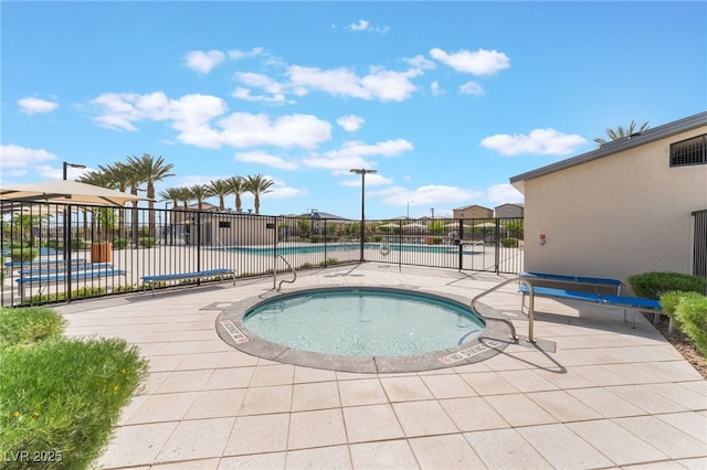 2902 Hemi Orange Ave, North Las Vegas, NV 89086 - community pool with a patio and fence