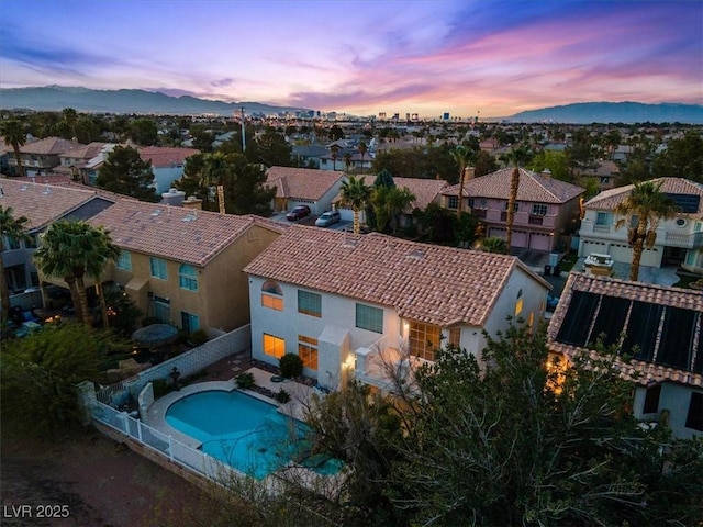 2445 Antler Point Dr, Henderson, NV 89074 - aerial perspective of suburban area featuring mountains and a pool area