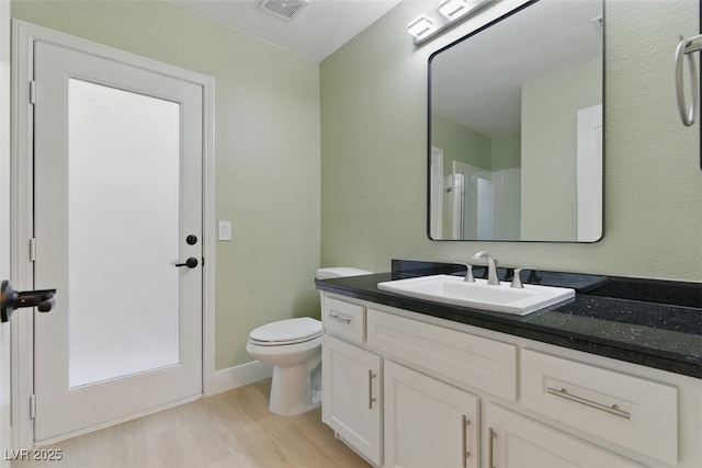 2445 Antler Point Dr, Henderson, NV 89074 - bathroom with vanity and wood finished floors