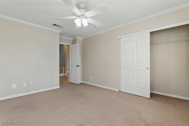 2445 Antler Point Dr, Henderson, NV 89074 - unfurnished bedroom with light carpet, ornamental molding, a closet, and a ceiling fan