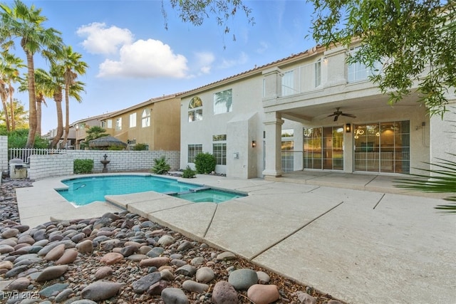 2445 Antler Point Dr, Henderson, NV 89074 - view of swimming pool with a ceiling fan, a patio, a fenced backyard, and a pool with connected hot tub