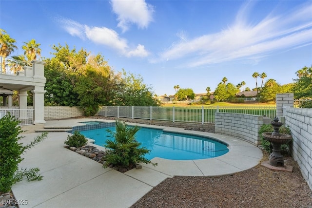 2445 Antler Point Dr, Henderson, NV 89074 - view of swimming pool featuring a fenced backyard, a patio area, and a pool with connected hot tub