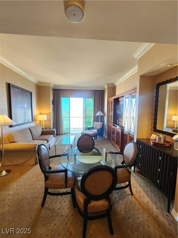 135 E Harmon Ave Unit 3320, Las Vegas, NV 89109 - dining area with ornamental molding