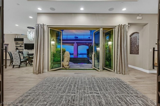 10 Olympia Outlook Dr, Las Vegas, NV 89141 - hall featuring wood finished floors, recessed lighting, and baseboards
