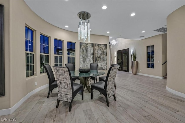 10 Olympia Outlook Dr, Las Vegas, NV 89141 - dining space featuring wood finished floors, a chandelier, visible vents, and baseboards