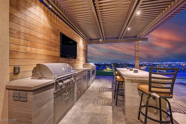 10 Olympia Outlook Dr, Las Vegas, NV 89141 - view of patio featuring area for grilling, outdoor wet bar, and exterior kitchen