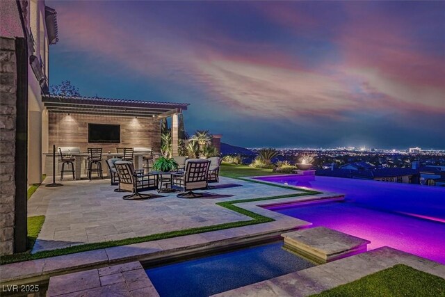 10 Olympia Outlook Dr, Las Vegas, NV 89141 - outdoor pool featuring area for grilling and a patio area