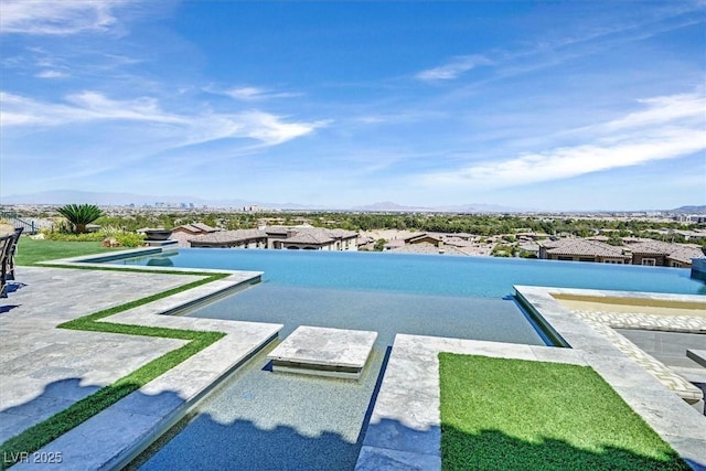 10 Olympia Outlook Dr, Las Vegas, NV 89141 - view of swimming pool with an infinity pool and a mountain view