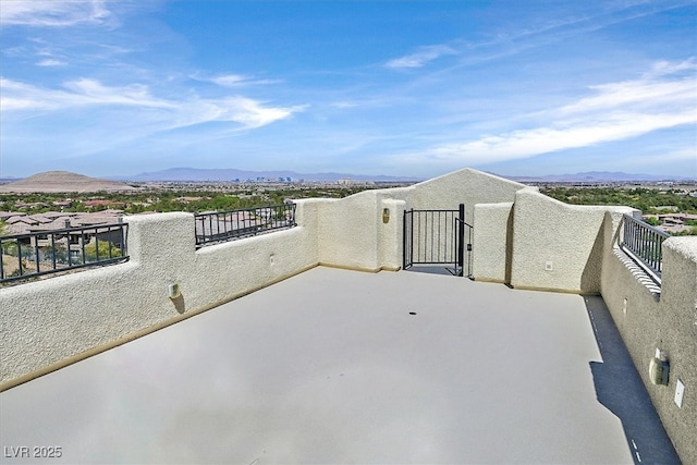 10 Olympia Outlook Dr, Las Vegas, NV 89141 - exterior space with stucco siding, a balcony, and a mountain view