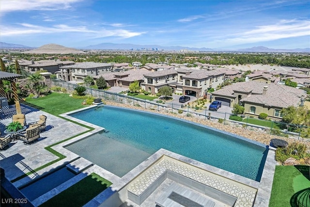 10 Olympia Outlook Dr, Las Vegas, NV 89141 - view of pool with fence, a patio, and a residential view