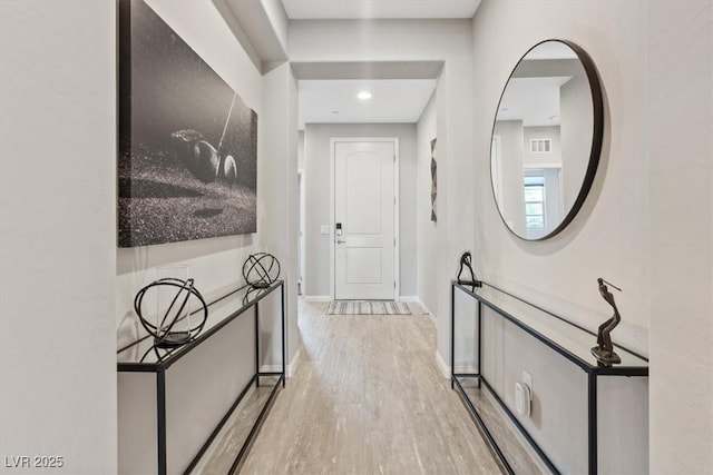 1225 Olivia Pkwy, Henderson, NV 89011 - corridor featuring visible vents, baseboards, and wood finished floors