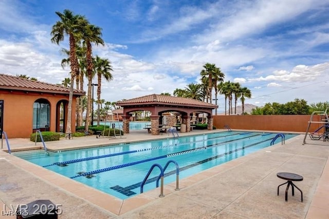 1225 Olivia Pkwy, Henderson, NV 89011 - pool featuring a patio and fence