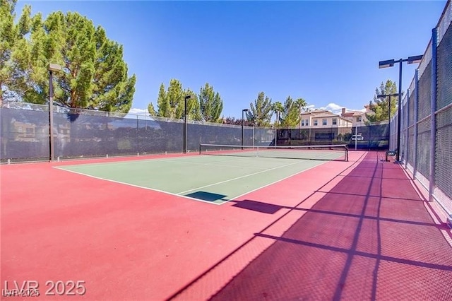 1225 Olivia Pkwy, Henderson, NV 89011 - view of tennis court with fence and community basketball court