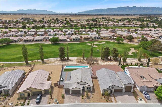 5455 Eleganza Ave, Pahrump, NV 89061 - birds eye view of property featuring a mountain view, a residential view, and view of golf course