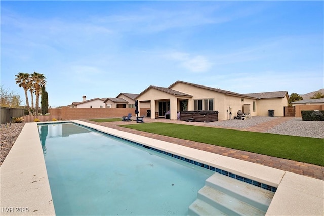 5455 Eleganza Ave, Pahrump, NV 89061 - view of pool with a patio area, a fenced backyard, a fenced in pool, and a hot tub